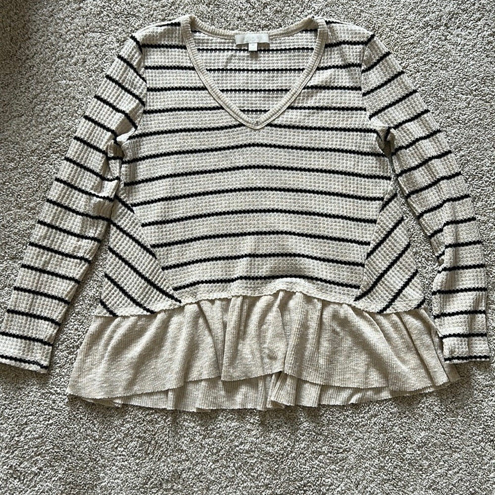 Cream and black striped peplum top
